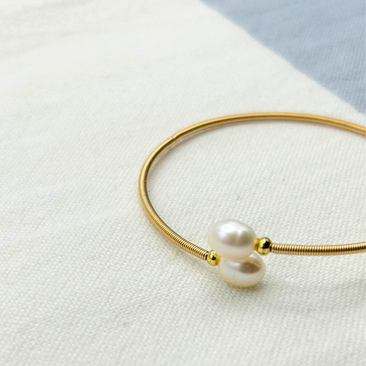 Two Pearls on a Bangle