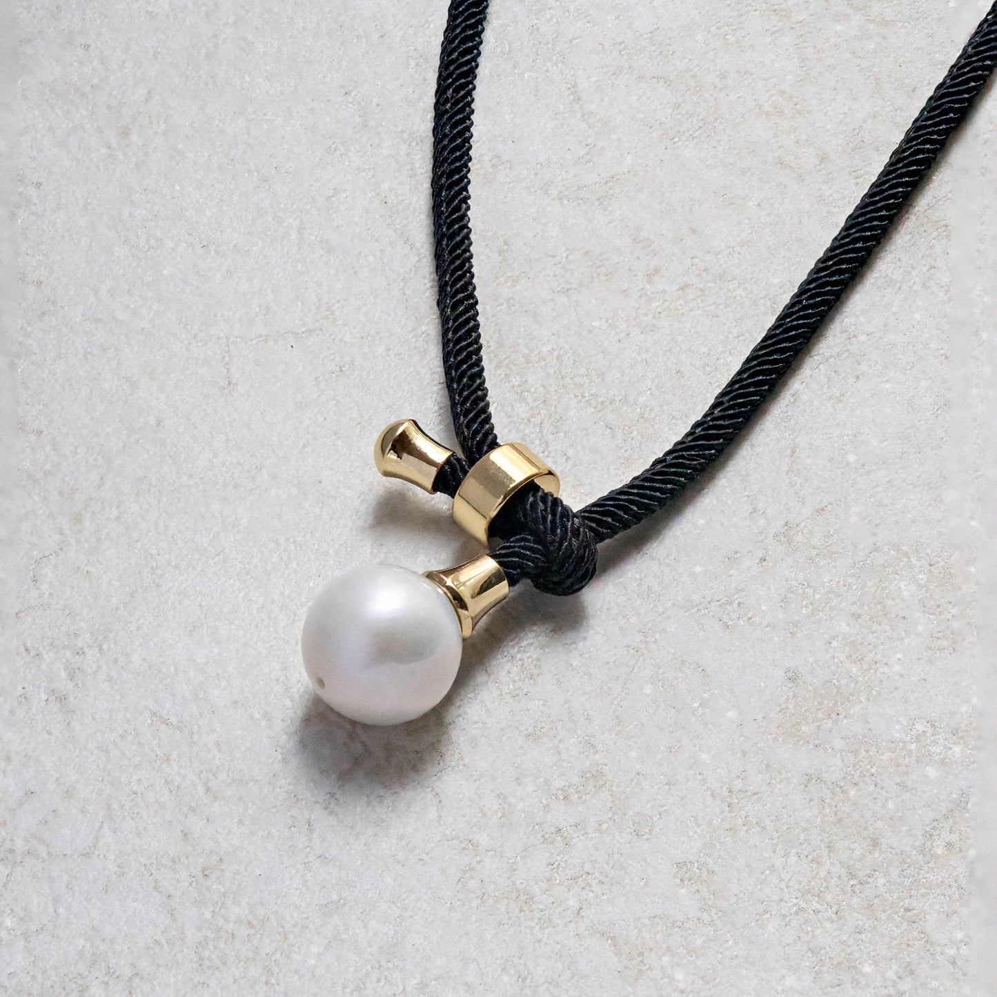 Single Pearl Necklace on Black Rope